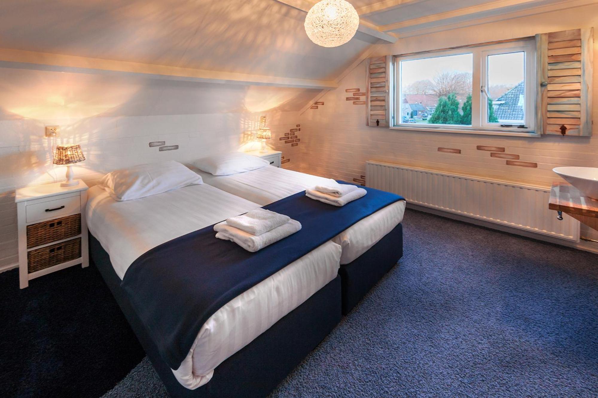 Hotel Hartlief Buinen Habitación foto