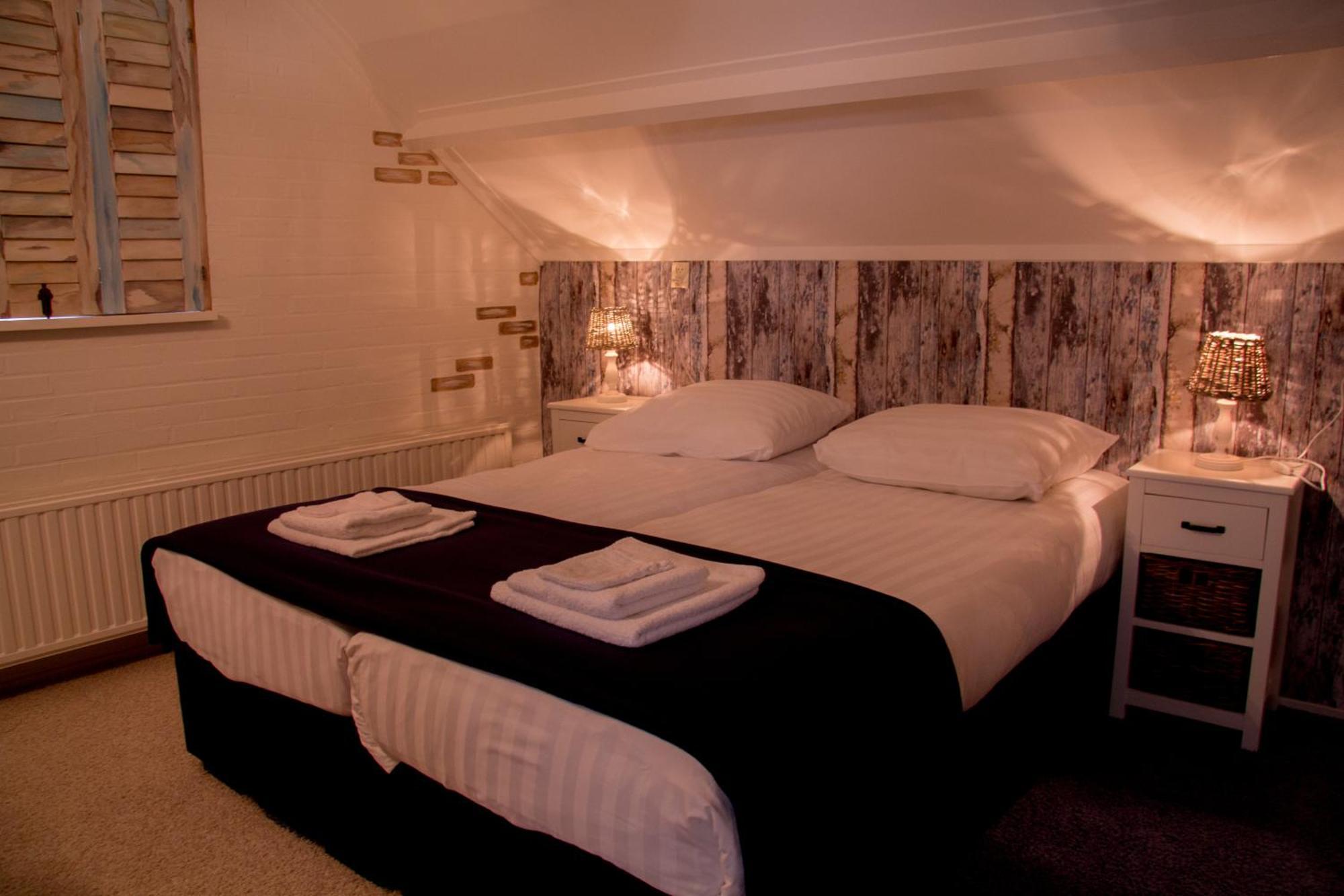 Hotel Hartlief Buinen Habitación foto